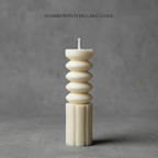 Hybrid totem pillar candle on a gray background