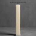 Beige square column pillar candle on a gray background