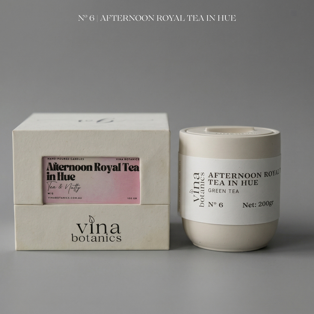 Vina Botanics Afternoon Royal Tea in Hue candle with packaging on a gray background