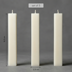 Three white candles of different heights on a gray background with measurements.