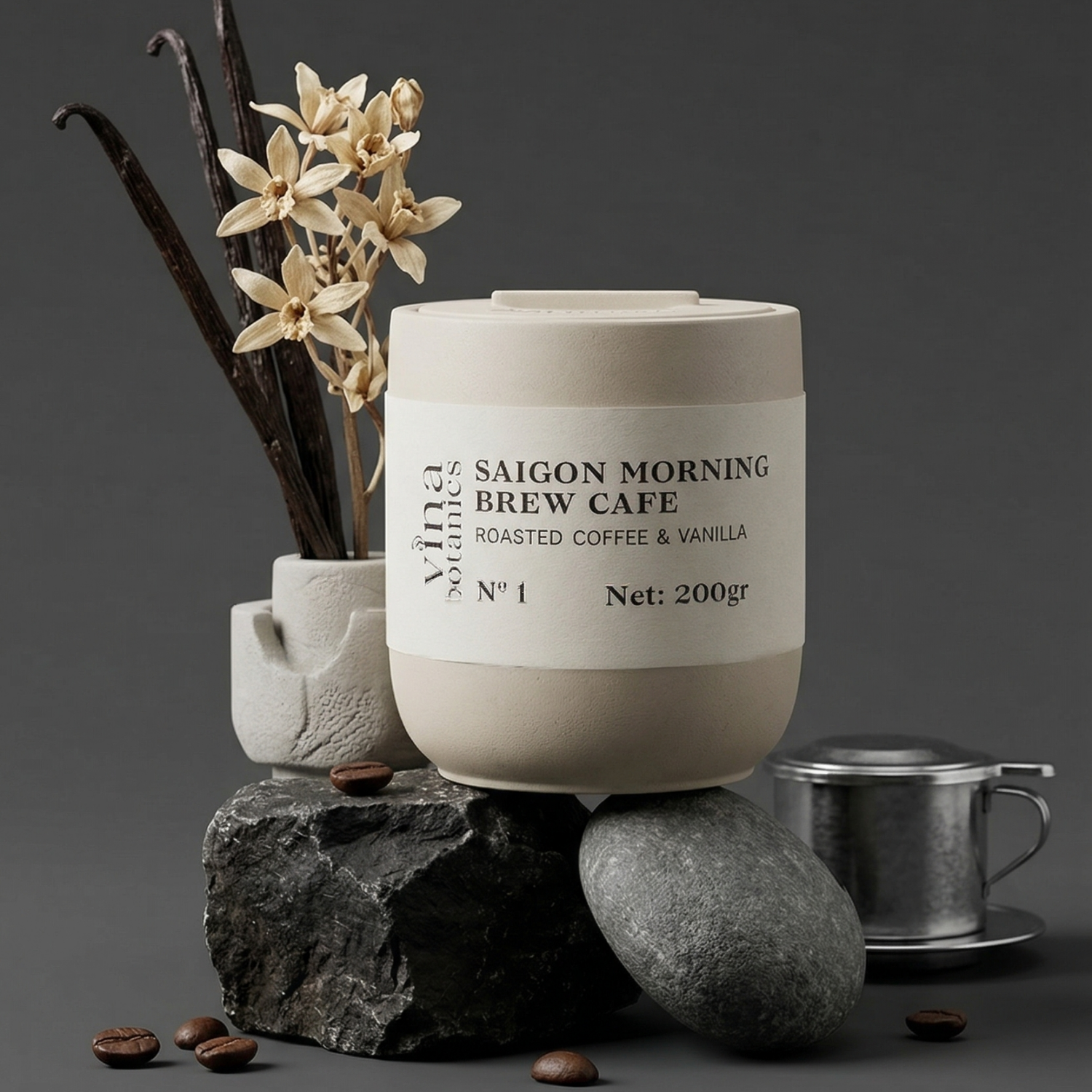 Ceramic container labeled 'Saigon Morning Brew Cafe' with coffee beans and flowers on a dark background