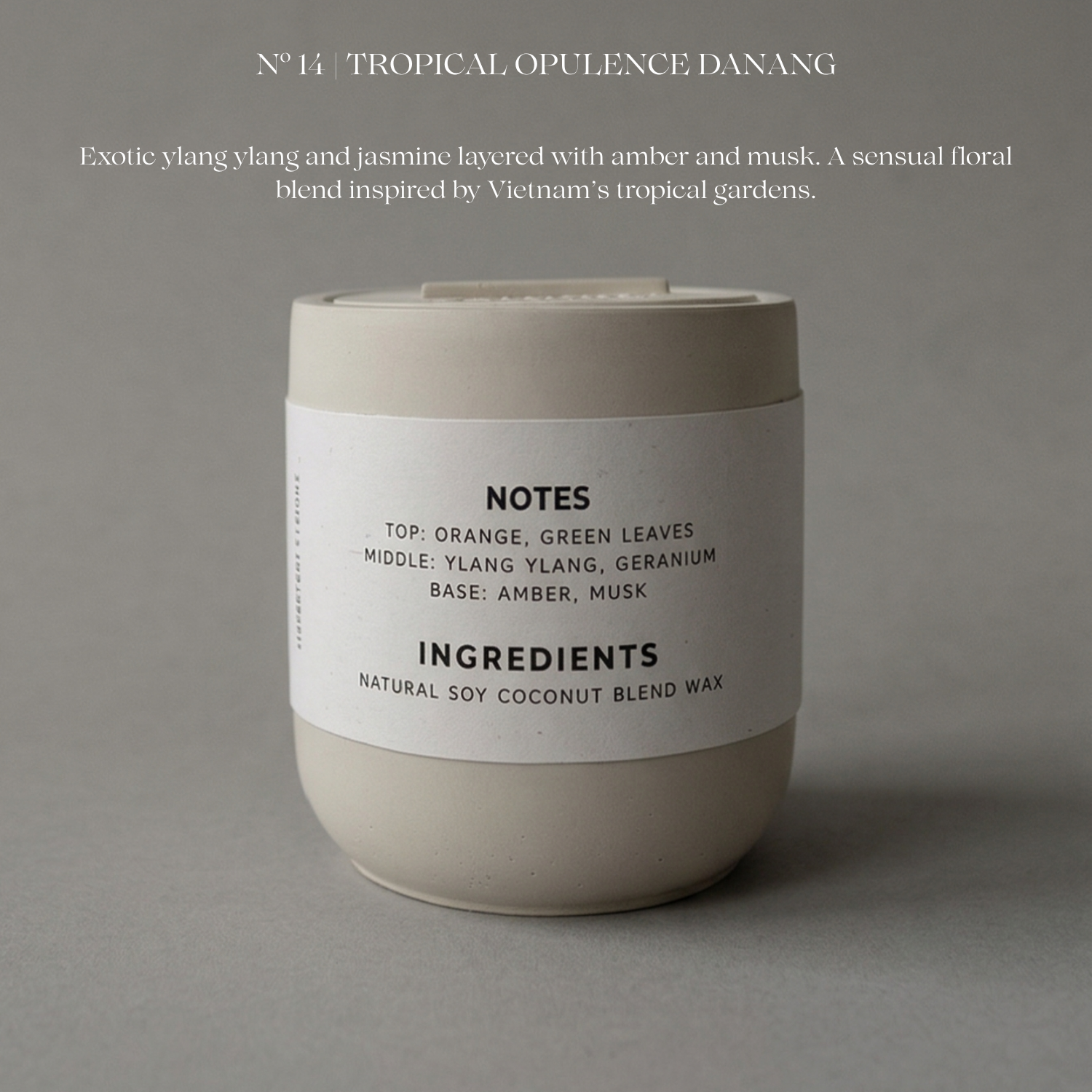 Candle with a label on a gray background