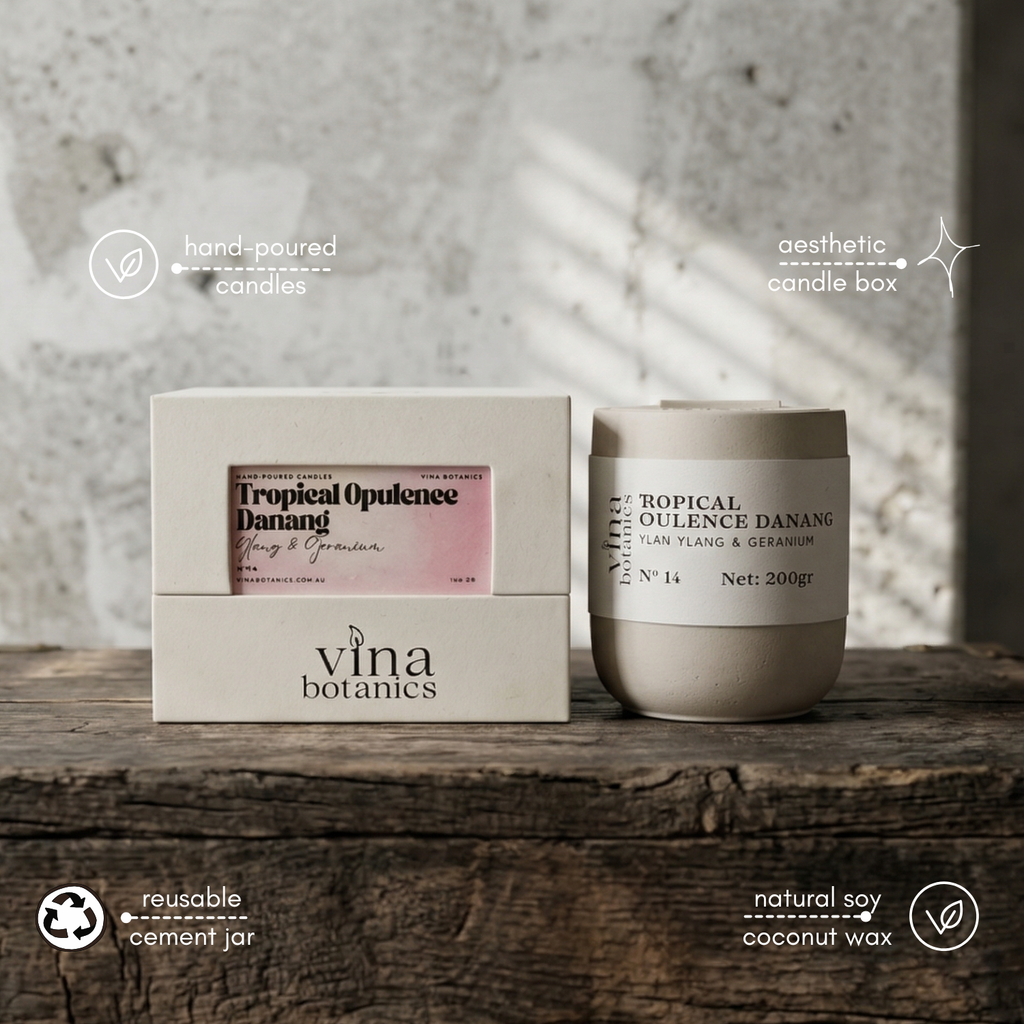 Vina Botanics candle and packaging on a wooden surface with a neutral background