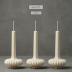 Three small ribbed candles on a gray background with text 'set of 3' and 'small'.
